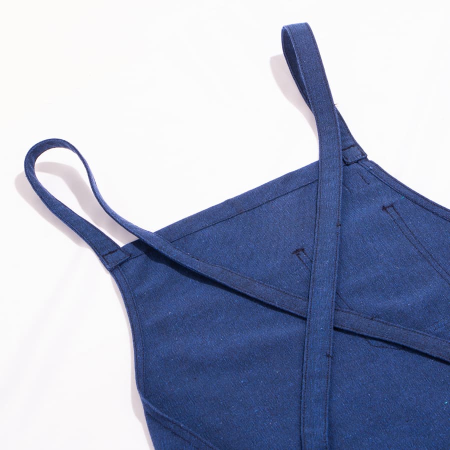 Close-up of Morada apron cross-back straps